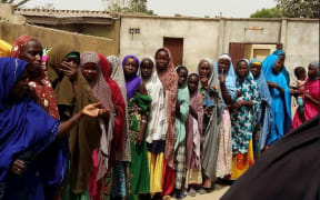 Displaced Nigerian women queuing for NZ donated goods. Maiduguri, 2016