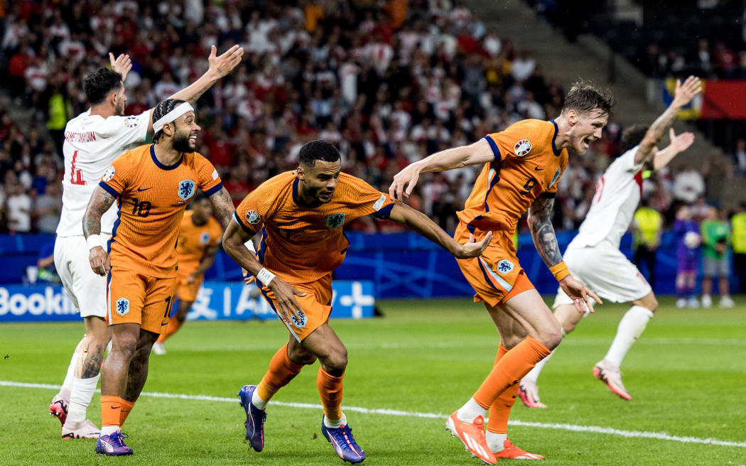 Memphis Depay , Cody Gakpo , Wout Weghorst , celebration during the UEFA Euro 2024 Quarter Final match between Netherlands v Turkey, at the stadium in Berlin, Germany, on July 6, 2024. (Photo by Foto Olimpik/NurPhoto) (Photo by Foto Olimpik / NurPhoto / NurPhoto via AFP)