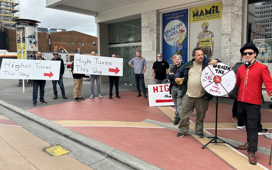 Members of the Taxpayers Union protest outside the Labour Party conference.