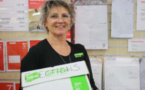 Paper Plus manager Karen Gibb with their makeshift 'elections' box to help customers who missed the mailing deadline.