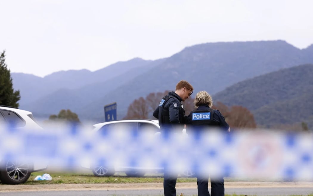 Australian police at the scene near Porepunkah where three officers were shot.