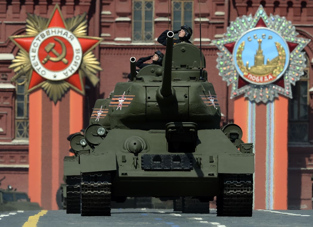 Russian T-34 Soviet-made tanks drive through Red Square during the Victory Day military parade in Moscow.