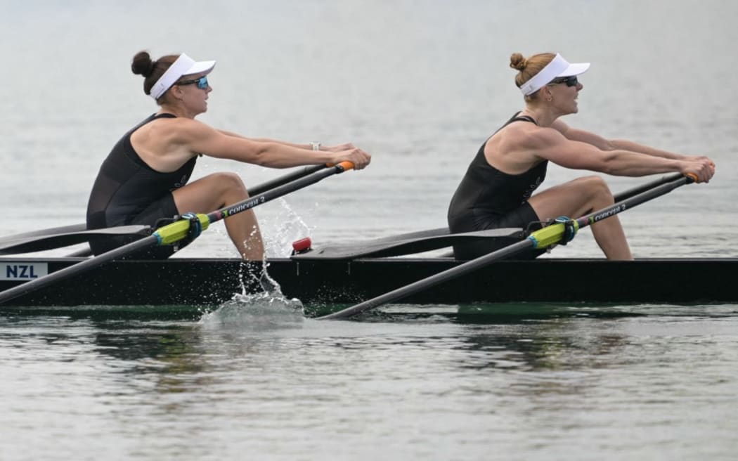New Zealand's Shannon Cox (L) and New Zealand's Jackie Kiddle compete in the lightweight women's double sculls semifinal A/B rowing competition at Vaires-sur-Marne Nautical Centre in Vaires-sur-Marne during the Paris 2024 Olympic Games on July 31, 2024. (Photo by Bertrand GUAY / AFP)