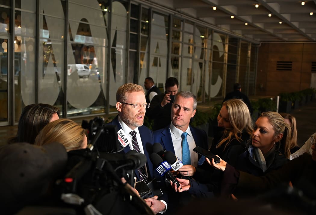 ABC editorial director Craig McMurtrie speaks to the media as police raid the headquarters of public broadcaster in Sydney on 5 June.