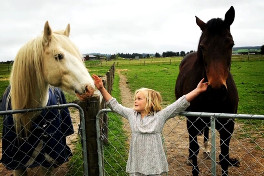 Danielle's daughter Elise with Bo (on left)