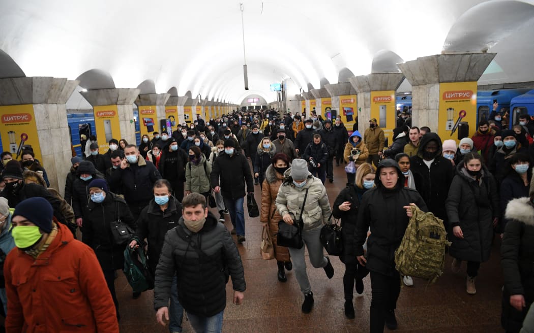 People in a metro station in Kyiv early on February 24, 2022.