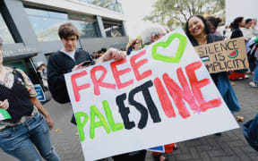 Students gather at Auckland University's city campus to rally against Israel's war in Gaza on 1 May 2024.