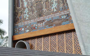 Papua New Guinea's parliament facade, after the removal of anthropomorphic carved heads from the front lintel.
