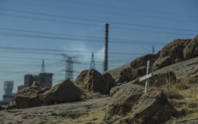 A cross on the Koppie pays tribute to the dead miners near Lonmin mine in Marikana.