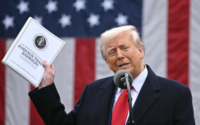 US President Donald Trump delivers remarks on reciprocal tariffs during an event in the Rose Garden entitled "Make America Wealthy Again" at the White House in Washington, DC, on April 2, 2025. Trump geared up to unveil sweeping new "Liberation Day" tariffs in a move that threatens to ignite a devastating global trade war. Key US trading partners including the European Union and Britain said they were preparing their responses to Trump's escalation, as nervous markets fell in Europe and America. (Photo by Brendan SMIALOWSKI / AFP)