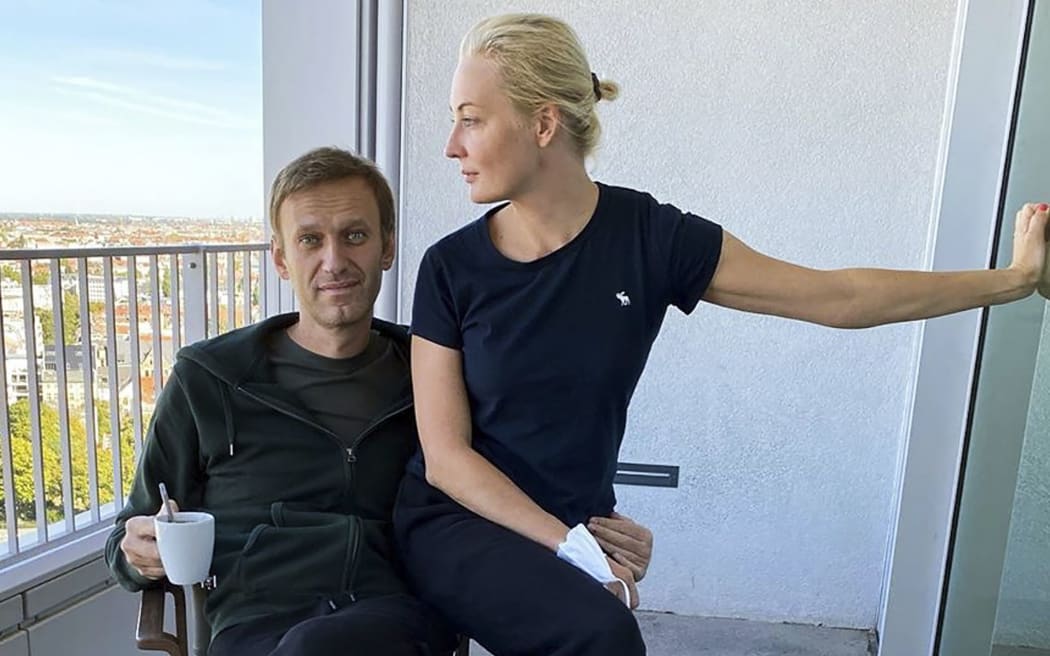 This handout picture posted on September 21, 2020 on the Instagram account of @navalny shows Russian opposition leader Alexei Navalny and his wife Yulia Navalnaya in Berlin's Charite hospital.