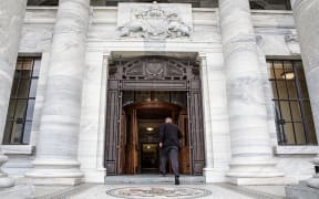 Entering Parliament House through the main doors, only used for ceremonial occasions