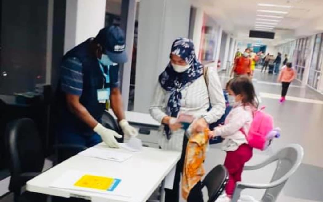 Covid-19 health screening at the Jackson International Airport in Port Moresby.