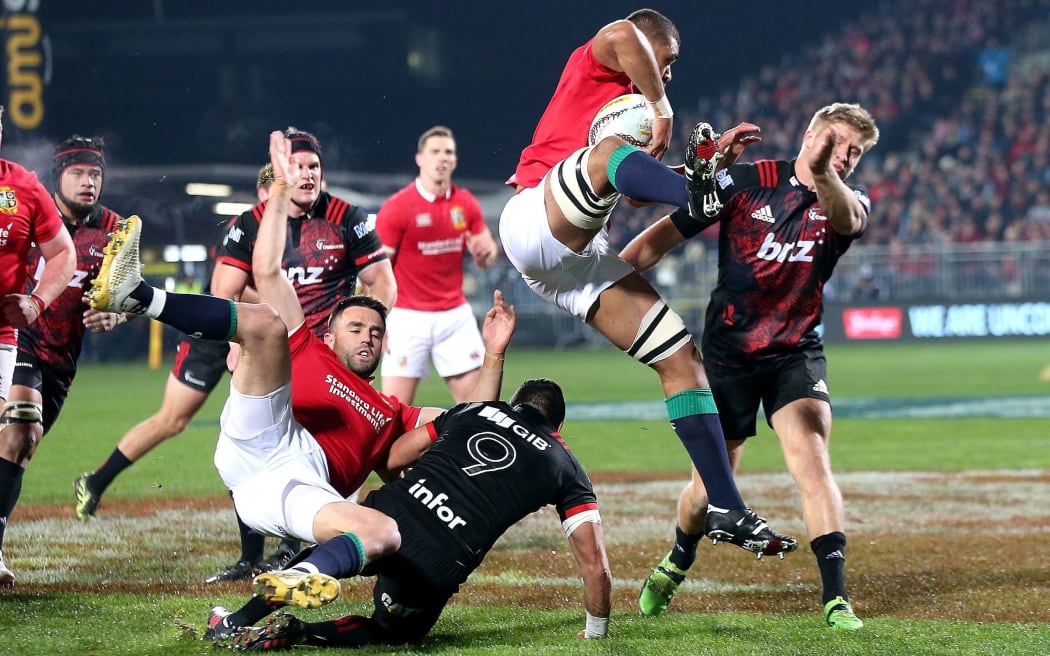 Taulupe Faletau claims a high ball for the Lions.