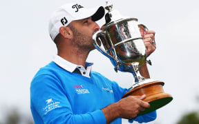 Michael Hendry with the Brodie Breeze trophy.