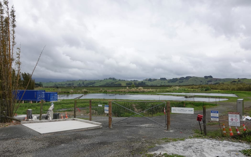 Rāwene’s wastewater treatment plant with the new electrocoagulation unit in the blue shipping containers.