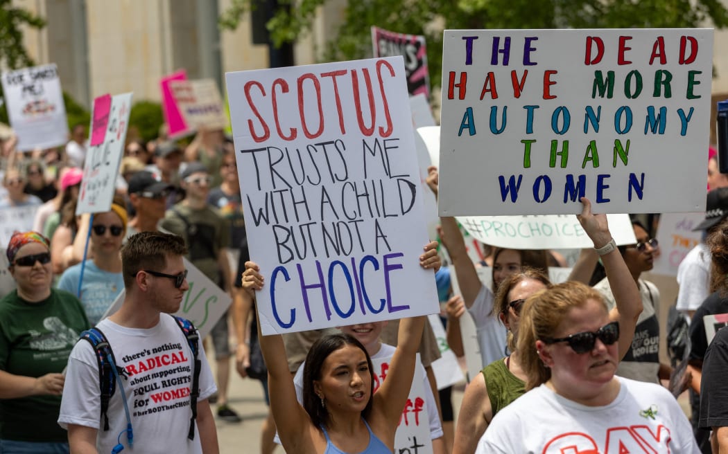 Abortion rights advocates gather and march outside the Hamilton County Courthouse after the Supreme Court overturned Roe v. Wade last week — ending a woman’s constitutional right to abortion which has been precedent and law for nearly 50 years. Saturday, July 2, 2022, in Cincinnati, Ohio, USA. (Photo by Jason Whitman/NurPhoto) (Photo by Jason Whitman / NurPhoto / NurPhoto via AFP)