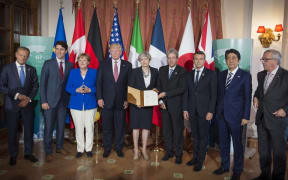 EU council President Donald Tusk  Canada PM Justin Trudeau, German chancellor Angela Merkel, US president Donald Trump, Great Britain PM Theresa May, Italy's PM Paolo Gentiloni, president of France Emmanuel Macron, Japan PM Shinzo Abe and president of the EU commission Jean-Claude Juncker.