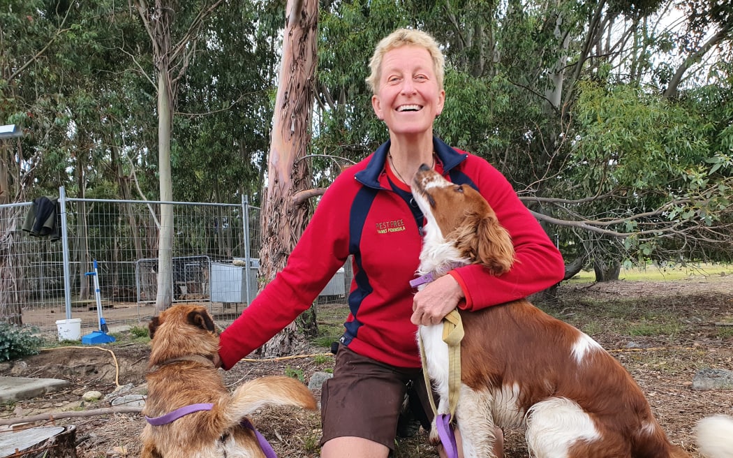 Karin Bos of Pest Free Banks Peninsula with her pest control dogs