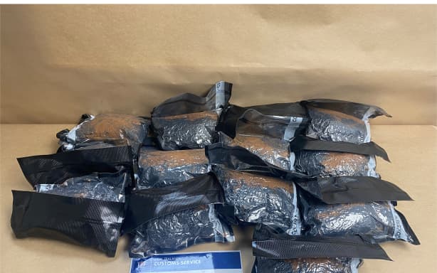 The contents of a suitcase seized at Auckland airport were vacuum sealed and contained $3.9 million worth of methamphetamine and $776,000 worth of cocaine.