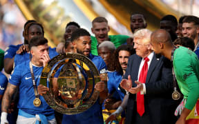 There appeared to be some confusion among Chelsea players during their trophy celebrations when President Donald Trump remained on stage.