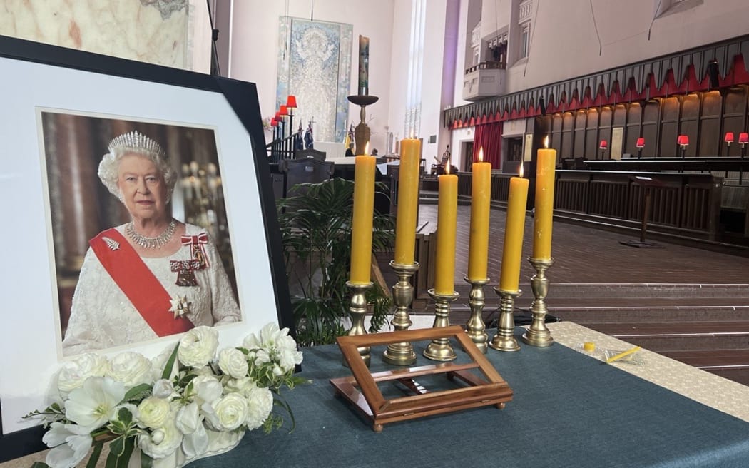 The late queen's photo at the state memorial service in Wellington.