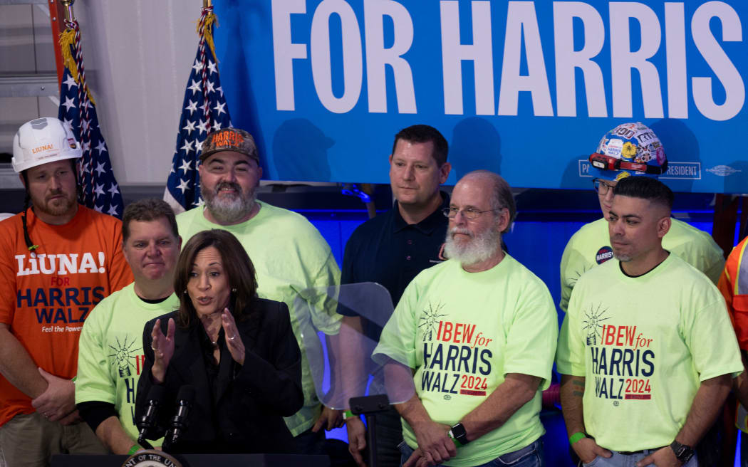 US Vice President and Democratic presidential candidate Kamala Harris speaks at the International Brotherhood of Electrical Workers (IBEW), Local 890, union office during a campaign stop in Janesville, Wisconsin, on November 1, 2024. (Photo by Brendan Smialowski / AFP)