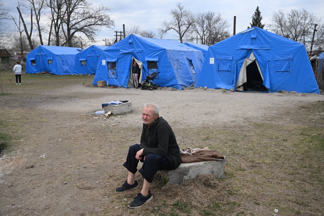 This image from Russian state-agency Sputnik shows a man from Mariupol at a refugee centre in Bezymennoe village, Eastern Ukraine.
