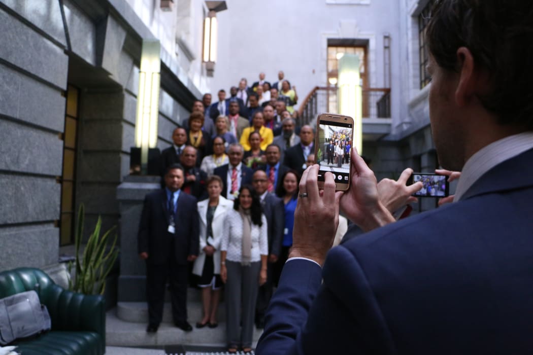 Pacific parliamentarians getting their photo taken in Wellington as part of the Pacific parliamentary forum.
