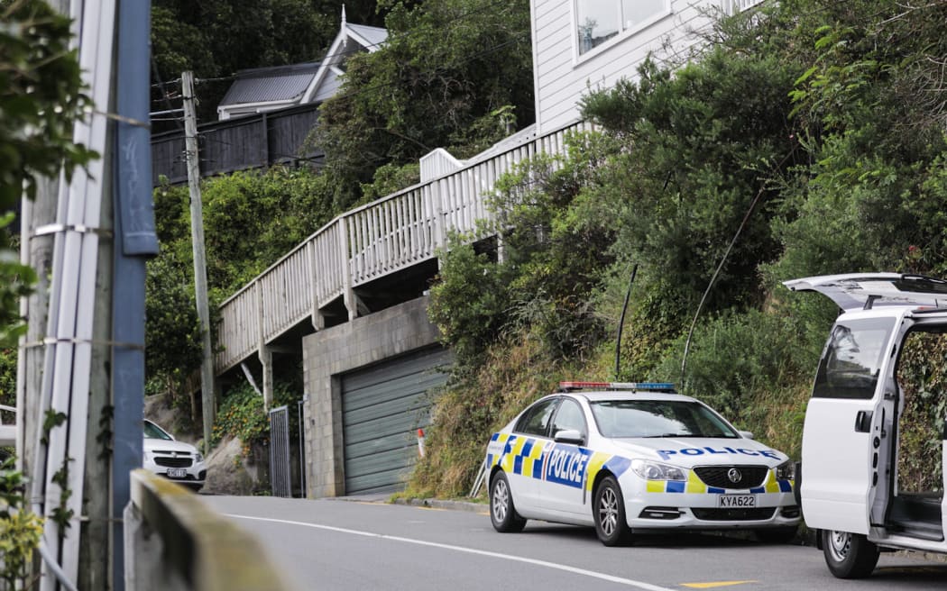 A police car outside a home on Palliser Road in the Wellington suburb of Roseneath, where two people were found dead on April 1.