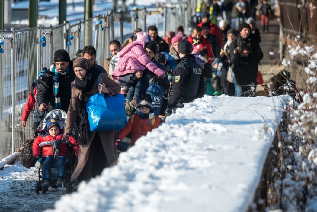 Refugees arrive in Germany in January 2016.