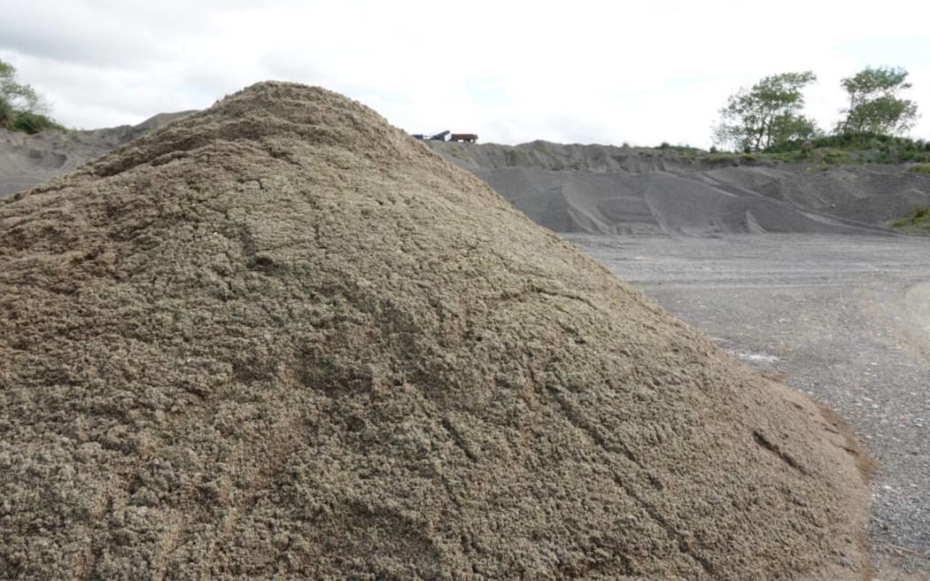 Finely crushed glass looks and feels like sand.