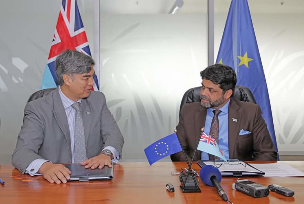 EU Ambassador to the Pacific, Sujiro Seam, left and Fiji's Minister for Economy, Aiyaz Saiyed Khaiyum.