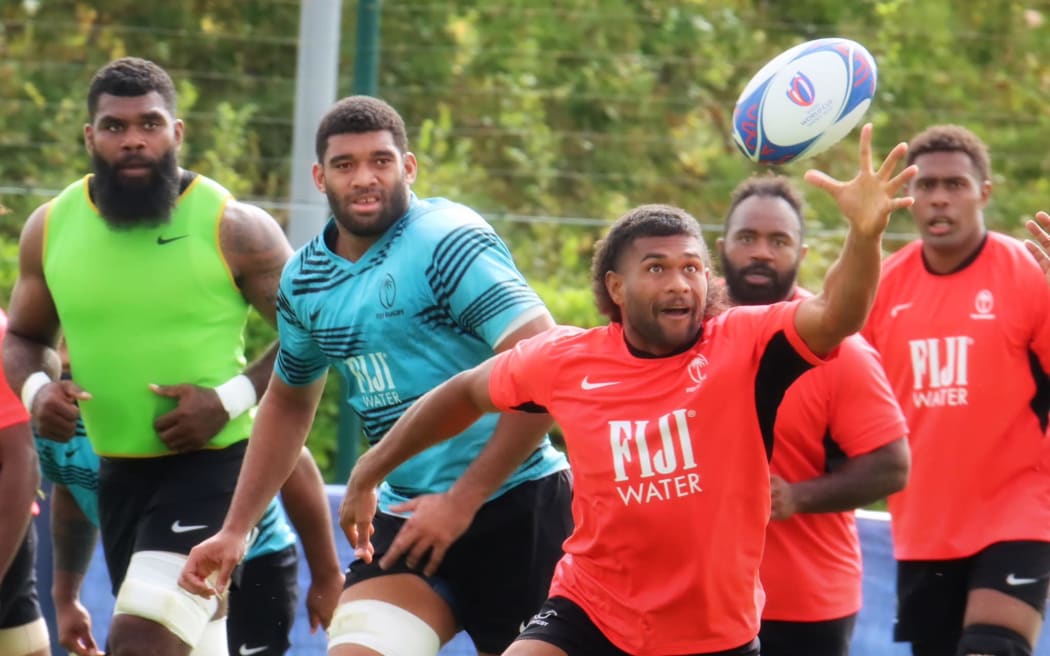 Simione Kuruvoli on the ball as Fiji players train in Bordeaux