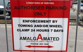 Amalgamated Car Parking Services enforcement message at the Neilson St car park.
