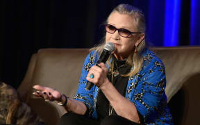 Actress Carrie Fisher speaks onstage during Wizard World Comic Con Chicago 2016. She died in December that year.