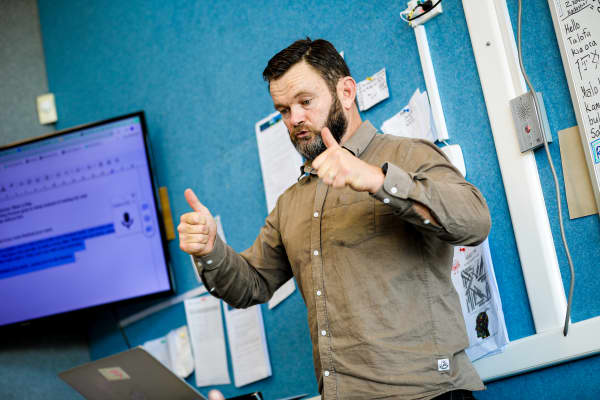 Phillip King, a teacher at Oranga School, working in the classroom that he leads with 9 and 10 year old students.
