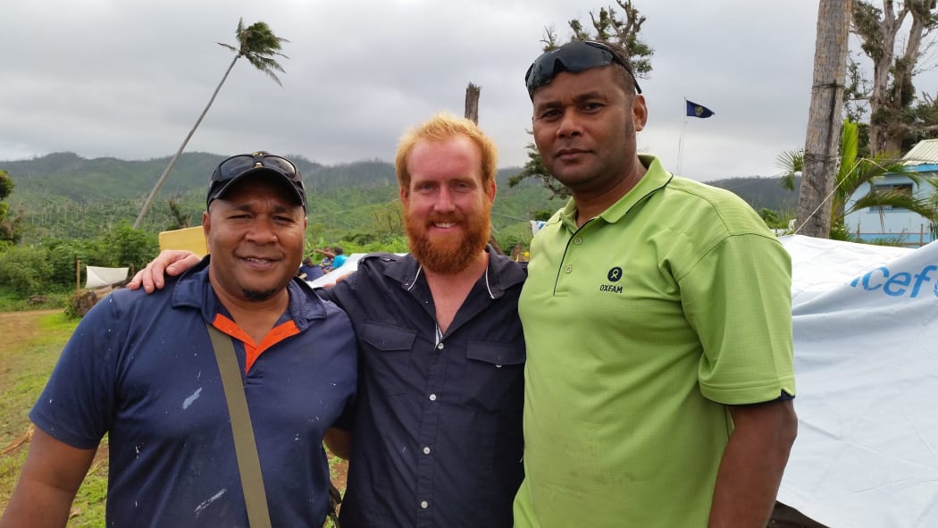 Aid workers Elazar Duiabe from Oxfam, Reuben Grandon from All Hands Volunteers and Taitusi Tubuitamana from Oxfam