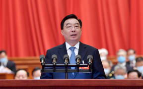 National People's Congress standing committee vice-chairman Wang Chen speaks at the opening meeting of the fourth session of the NPC in Beijing, China, March 5, 2021.