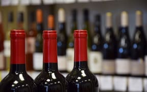 Wine bottles in wine store and ready for home delivery