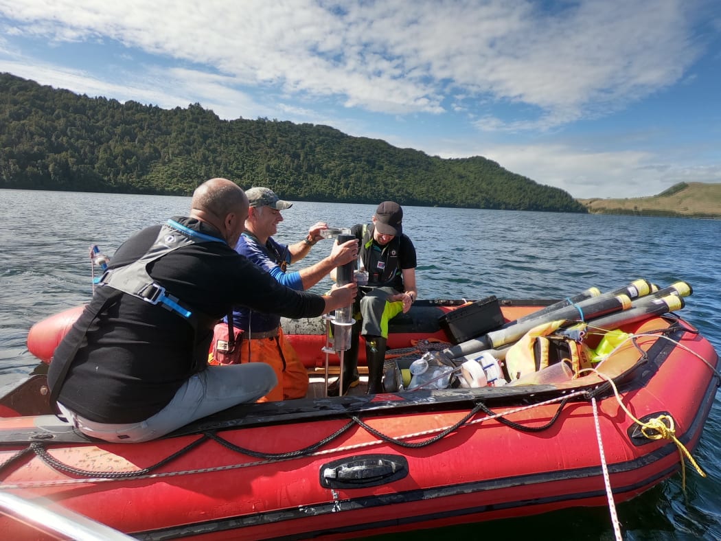 Collecting lake samples for 'Lakes 380 - Our lakes' health - past, present, future' project.