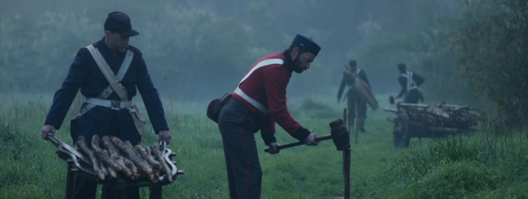 British Soldiers survey the fertile Taranaki lands.