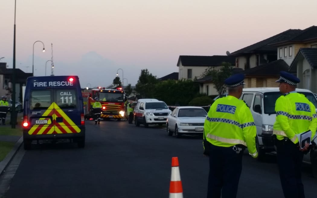Emergency services at the cordon on Plantation Avenue.