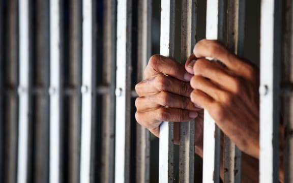 hand in jail