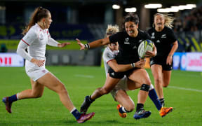 Stacey Fluhler of New Zealand is tackled during the Rugby World Cup 2021 Final match between New Zealand and England at Eden Park on November 12, 2022 in Auckland, New Zealand.