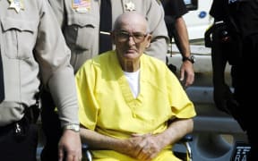 Edgar Ray Killen is escorted int o the Neshoba County Courthouse before sentencing 23 June 2005 in Philadelphia, Mississippi.