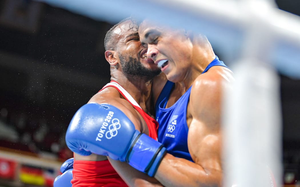 New Zealand boxer David Nyika appears to be bitten by his Moroccan opponent Youness Baalla in his round of 16 men's heavyweight bout at Kokugikan Arena, Tokyo, Japan, Tokyo 2020 Olympic Games. Tuesday 27 July 2021.