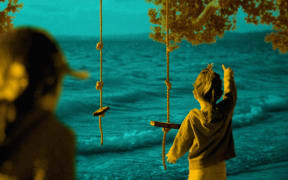 Children in front of sea