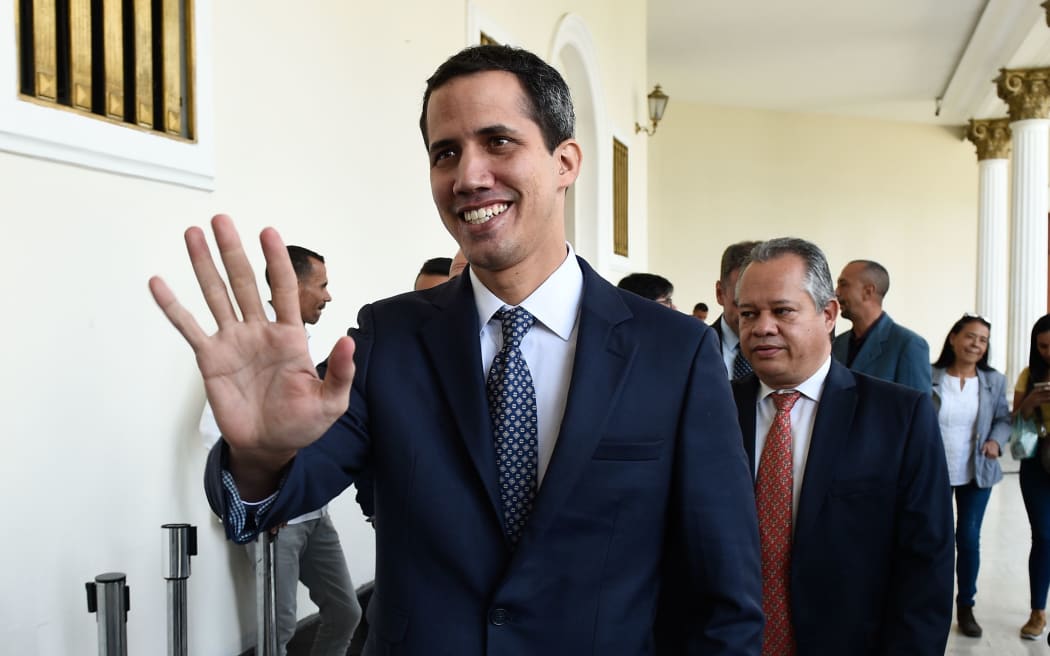 The president of Venezuela's opposition-led National Assembly, Juan Guaido, arrives for a session at the Federal Legislative Palace in Caracas.
