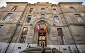 Geneva's courthouse is seen on August 29, 2022, at the opening of French-Israeli diamond magnate Beny Steinmetz appeal against a corruption sentence linked to mining rights in Guinea. The 66-year-old businessman was convicted in January 2021 of setting up a complex financial web to pay bribes to ensure his company could obtain permits in an area estimated to contain the world's biggest untapped deposits of iron ore. (Photo by Fabrice COFFRINI / AFP)